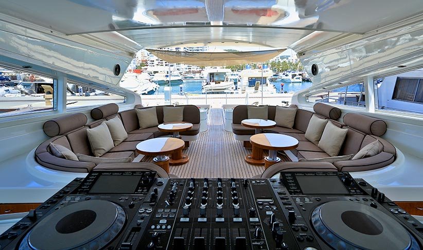 DJ decks set up on a luxury yacht deck in Dubai