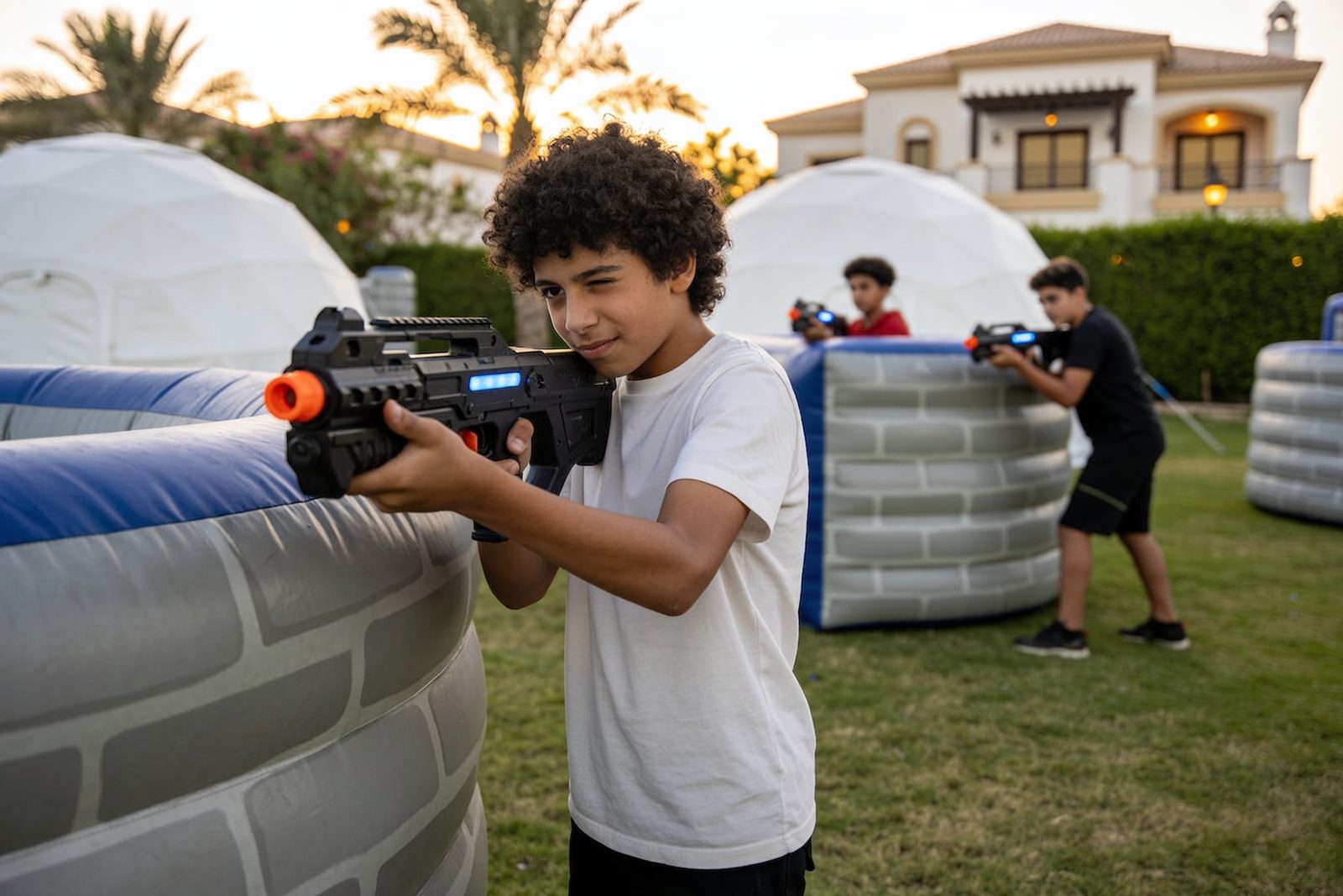 Kids playing laser tag at a birthday party in Dubai