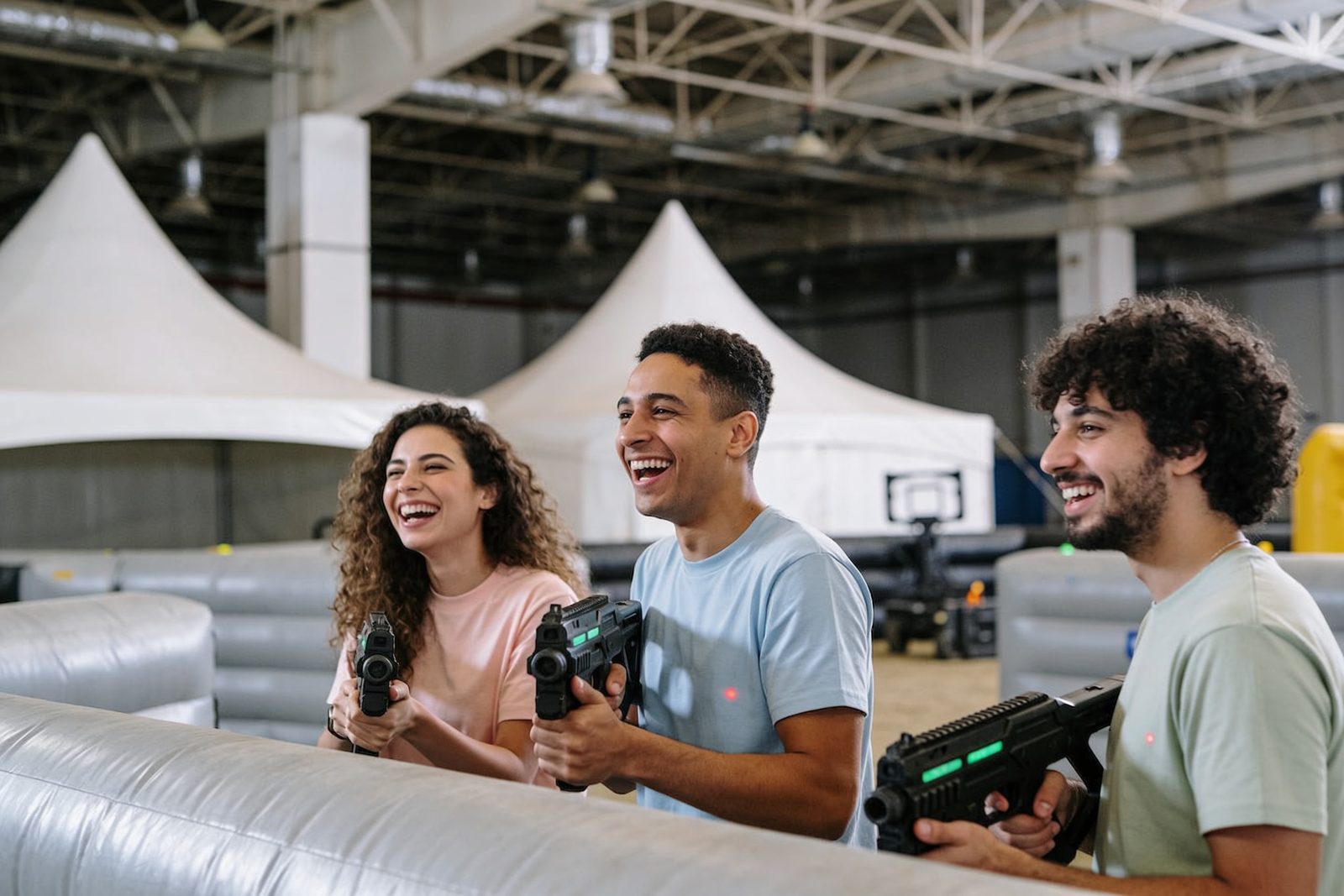 Adults playing laser tag at a corporate team building day in Dubai
