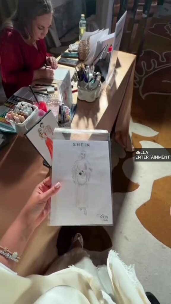 Live illustrator drawing guests at an event in Dubai Live illustrator drawing guests at an event in Dubai