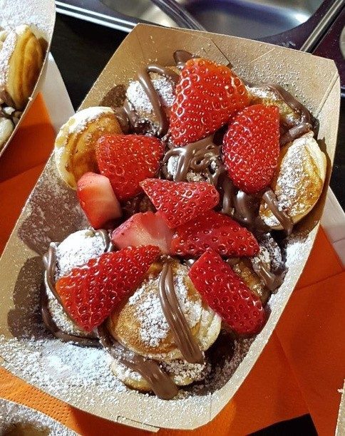 Mini pancakes with strawberries at a Dubai event
