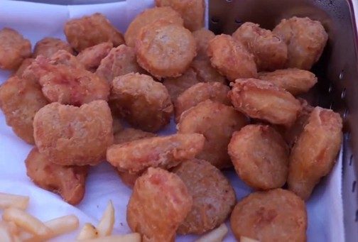 Nuggets and fries on table rental in Dubai